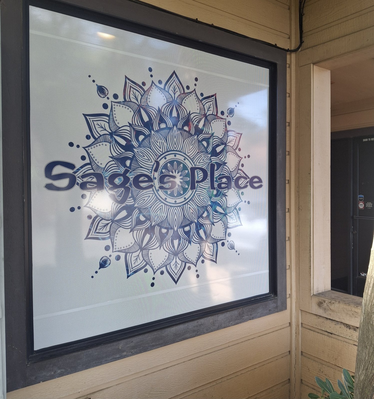 Sage's Place logo in the window — Suite C