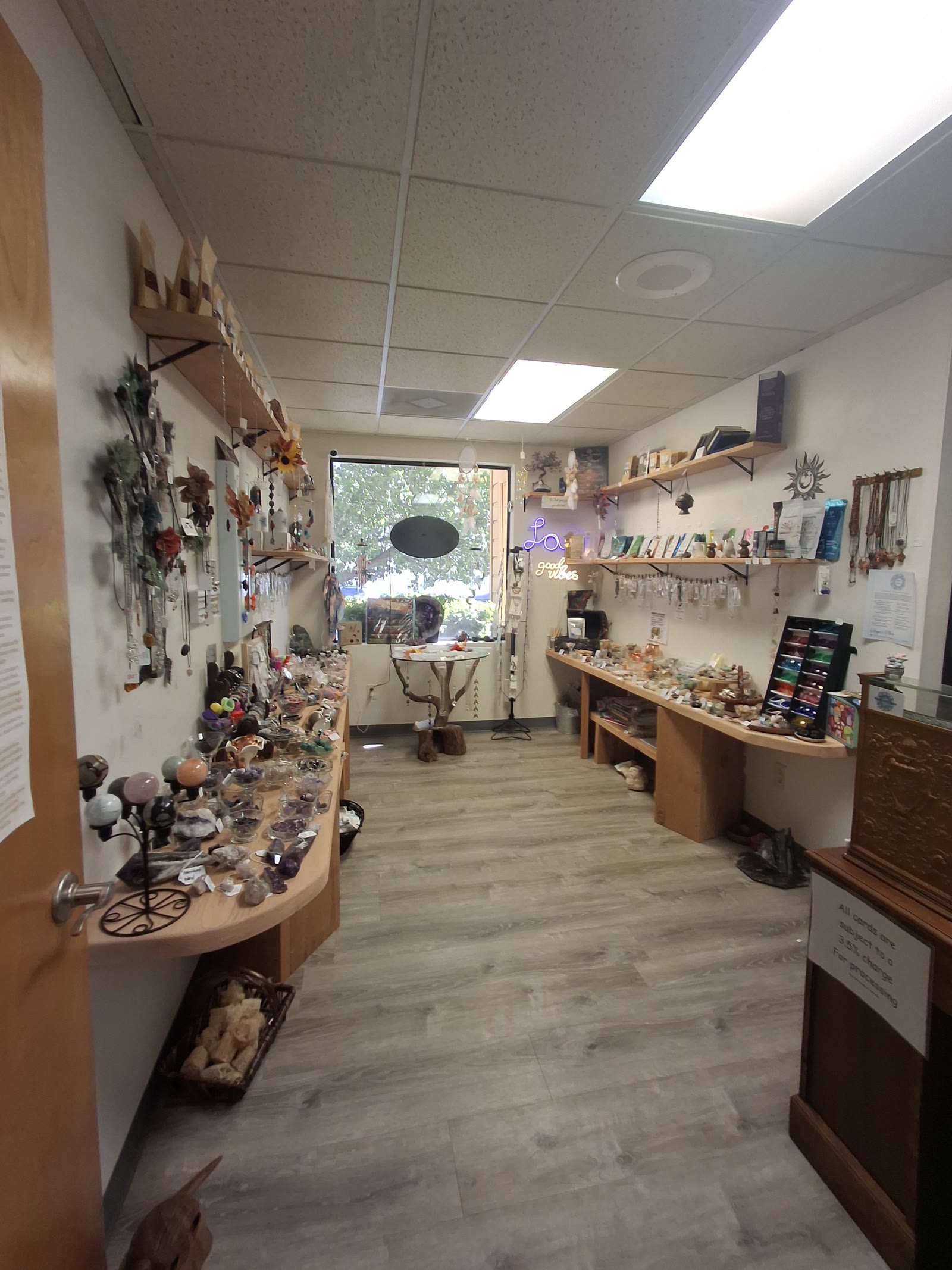 The crystal and vitamin shop at Sage's Place — shelves of crystals, supplements, and gifts